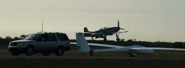 Mustang takeoff over Butler ASW-22